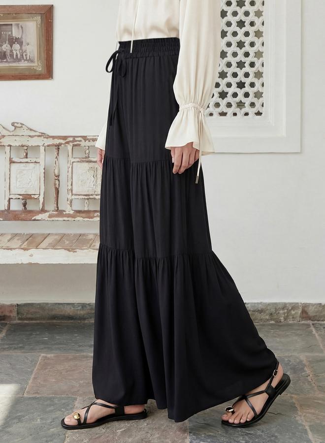 جلو باص بنطال بالازو أسود متعدد الطبقات بخصر برباط وحافة واسعة - Image 2